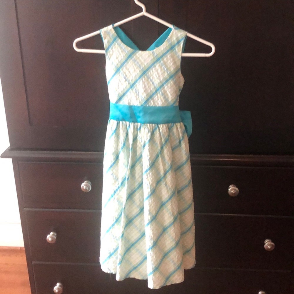 We have outgrown this dress worn once or twice